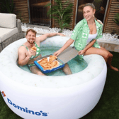 Love Island's Zara McDermott and Made in Chelsea's Sam Thompson have helped to launch the Domino's pizza limited edition fashion collection. Photo by Domino's Pizza.
