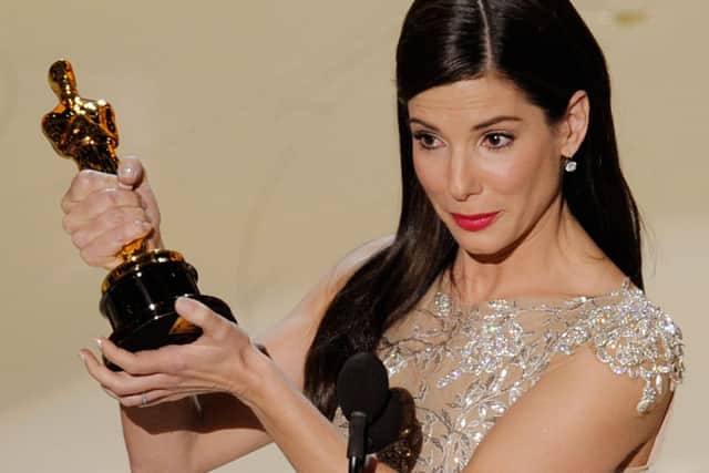 Sandra Bullock accepts Best Actress award for “The Blind Side” onstage during the 82nd Annual Academy Awards in 2010 (Photo: Kevin Winter/Getty Images)