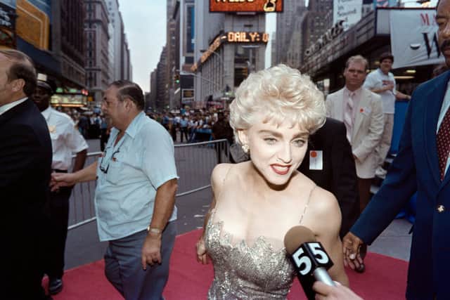 Singer and actress Madonna makes a rare appearance in Times square on August 6, 1987 in connection with her movie "Who's That Girl?"
