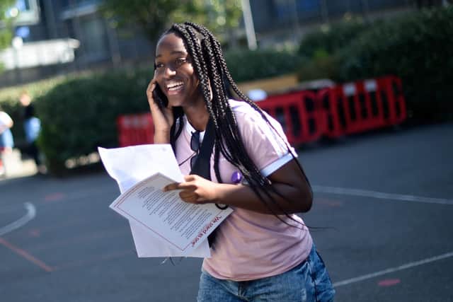 Student Ranita Addo reacts after opening her results on GCSE results day at the City of London Academy, Hackney on August 22, 2019 in London, United Kingdom. Credit: Peter Summer/Getty Images