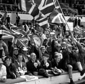 Some of the England fans wave their Union Jack flags at Wembley Stadium, London, for the 1966 World Cup Final against West Germany, which England won 4-2. (Photo by A. Jones/Evening Standard/Getty Images)