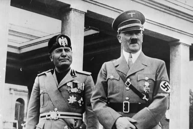 Italian fascist dictator Benito Mussolini and Adolf Hitler in Munich (Photo: Fox Photos/Getty Images)