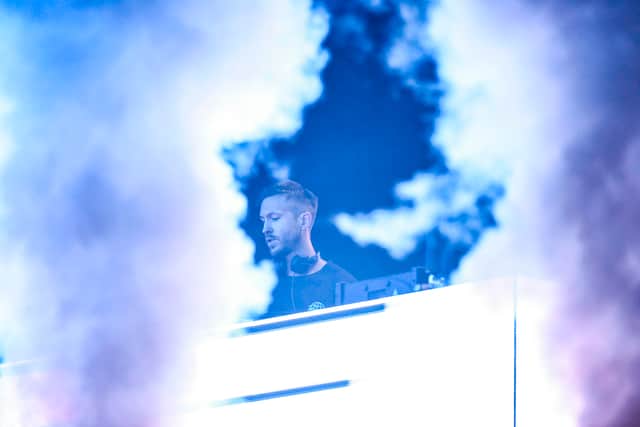 British DJ Calvin Harris performs on stage during the "Sunny Hill Festival" in Pristina late on August 5, 2019. (Photo by Armend NIMANI / AFP) 