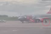 Moment armed police board Jet2 flight and remove man after bomb scare