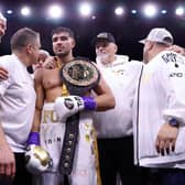 RIYADH, SAUDI ARABIA - FEBRUARY 26: Tommy Fury celebrates as they pose for a photo with their Title Belt, coaching team, brother Boxer Tyson Fury and Father John Fury after defeating Jake Paul during the Cruiserweight Title fight between Jake Paul and Tommy Fury at the Diriyah Arena on February 26, 2023 in Riyadh, Saudi Arabia. (Photo by Francois Nel/Getty Images)