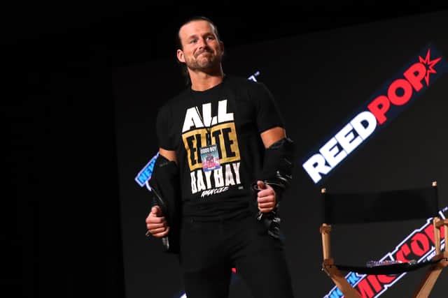 Adam Cole appears onstage during the All Elite Wrestling Invades New York Comic Con panel during Day 3 of New York Comic Con 2021 at Jacob Javits Center on October 09, 2021 in New York City. (Photo by Bennett Raglin/Getty Images for ReedPop)