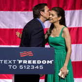 Florida Governor and 2024 presidential hopeful Ron DeSantis kisses his wife Casey DeSantis during a campaign stop at the Greenville Convention Center in Greenville, South Carolina, on June 2, 2023. The event is part of a four-day "Our Great American Comeback Tour" through twelve cities in Iowa, New Hampshire, and South Carolina. (Photo by Logan Cyrus / AFP) (Photo by LOGAN CYRUS/AFP via Getty Images)