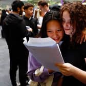 Lisa Nguyen (L) and Scarlett Granger (R) react as they receive their GCSE results at the City of London Academy on August 24, 2023 in London, England. Credit: Getty Images