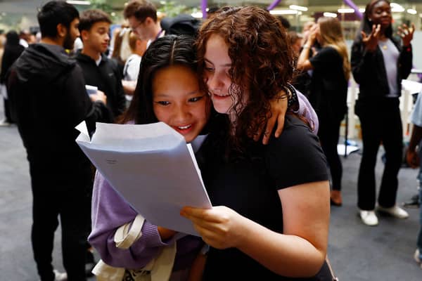 Lisa Nguyen (L) and Scarlett Granger (R) react as they receive their GCSE results at the City of London Academy on August 24, 2023 in London, England. Credit: Getty Images