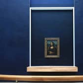 The portrait of Lisa Gherardini, wife of Francesco del Giocondo, known as the Mona Lisa or La Gioconda (La Joconde), painted by Italian artsist Leonardo da Vinci, is displayed at the Louvre museum, in Paris, on June 7, 2023. (Image: AURELIEN MORISSARD/POOL/AFP via Getty Images)