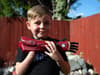 Cambridgeshire boy, seven, born without a hand gets to grips with new Iron Man arm