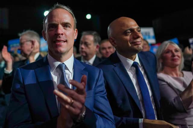Former Cabinet members Dominic Raab and Sajid Javid at the 2021 Tory conference. Both are standing down at the next election. Credit: Getty