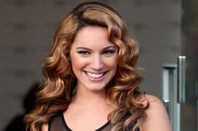 Model and media personality Kelly Brook is selling her most iconic designer clothes, including her eye-catching Love Island swimsuits, at auction. Photo by SWNS.