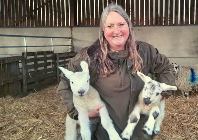 Jane Parlour on her North Yorkshire farm with lambs. 