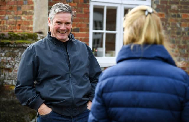 Labour leader Sir Keir Starmer is shown around a farm by NFU President Minette Batters. Credit: Getty