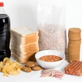 According to new studies, eating ultra-processed food such as fizzy drinks, mass-produced bread, breakfast cereals and crisps can increase the risk of heart attacks and strokes. (Credit: Getty Images)