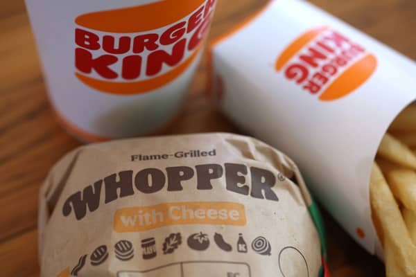 A Burger King Whopper hamburger is displayed. A federal lawsuit has been filed and is seeking class-action status alleging that fast food burger chain Burger King is misleading customers with imagery that portrays its food (Photo Illustration by Justin Sullivan/Getty Images)