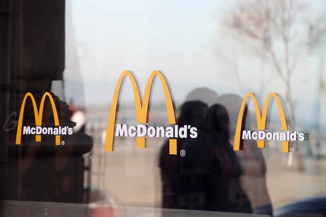 The McDonald's logo is displayed on the window of a McDonald's restaurant on January 30, 2018 in San Francisco, California. (Photo by Justin Sullivan/Getty Images)