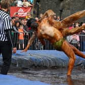 Hundreds of revellers descending on a pub garden in Lancashire to watch the world gravy wrestling championships