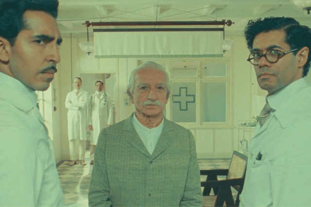 (L-R) Dev Patel, Sir Ben Kingsley and Richard Ayoade in Wes Anderson's 'The Wonderful Story of Henry Sugar' (Credit: American Empirical Pictures)