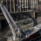 At least 73 people have died following a blaze at a five-storey building in South Africa's biggest city, Johannesburg. (Credit: AFP via Getty Images)