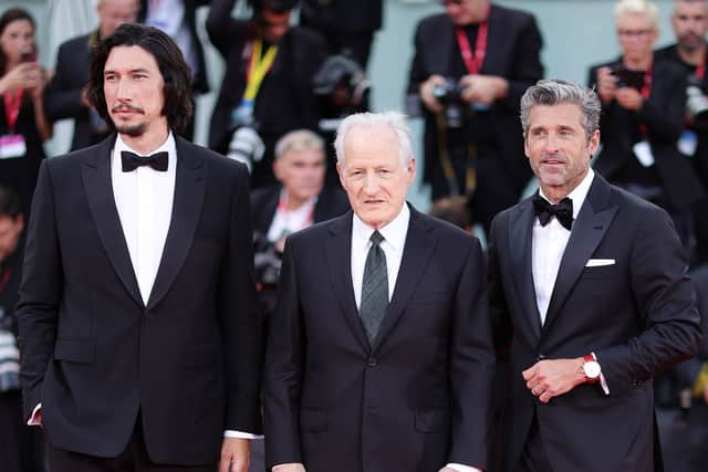  Adam Driver, Michael Mann and Patrick Dempsey attend a red carpet for the movie “Ferrari” at the 80th Venice International Film Festival (Photo:  Andreas Rentz/Getty Images)