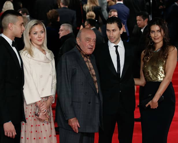 Mohamed Al Fayed with his children Omar and Karim at the Royal Film Performance of “Spectre” at Royal Albert Hall in 2015 (Photo: John Phillips/Getty Images)