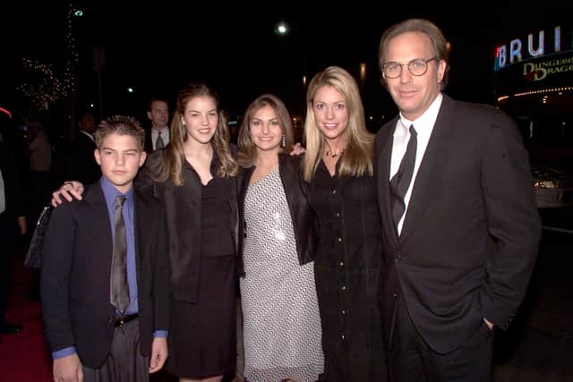 Kevin Costner and Christine Baumgartner with his children (L to R) Joe, Lilly and Annie in 2000 (Photo: Kevin Winter/Getty Images)