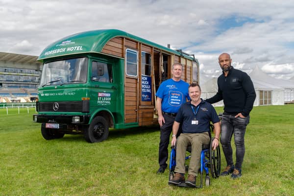 Win a stay in the Horsebox Hotel. From l-r, Andrew Gibson and Angus O'Donnell from MND Assocation and Jamie Jones-Buchanan