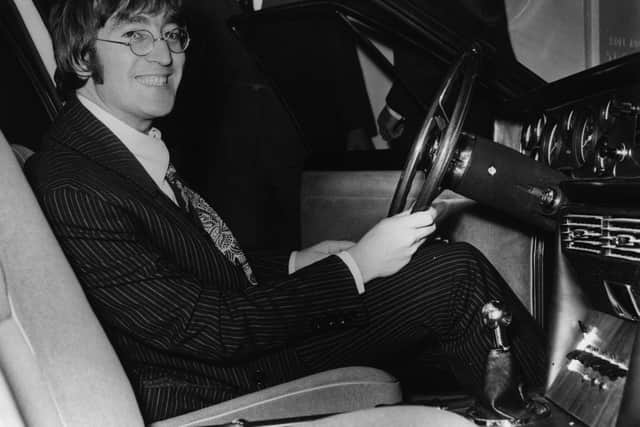 17th October 1967:  A happy John Lennon (1940 - 1980) at the wheel of the ISO Rivolta S4 car which he bought for £6,150 at the preview of the Motor Show.  (Photo by Keystone/Getty Images)
