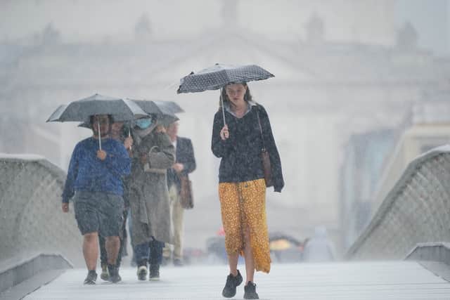 Storms to hit several UK regions this weekend amid scorching 33C highs. (Photo: Yui Mok/PA Wire) 
