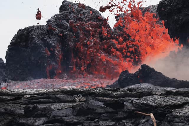 Lava erupts from a Kilauea volcano fissure in 2018 (Photo: Mario Tama/Getty Images)
