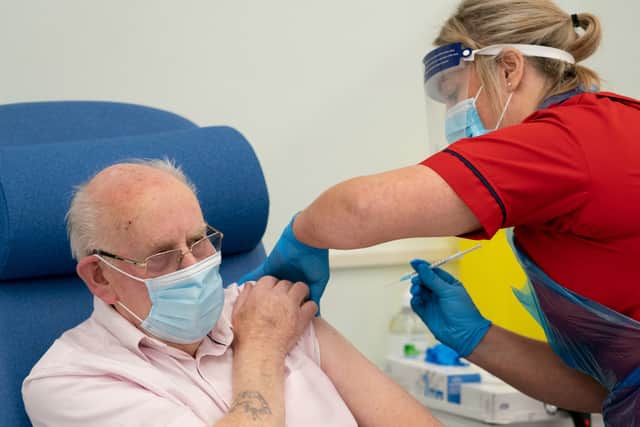 A patient is administered the first Pfizer-BioNTech Covid-19 vaccine in London at Croydon University Hospital in December 2020 (Photo Dan Charity - Pool/Getty Images)