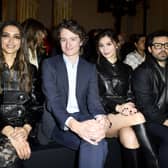 (L-R) Deepika Padukone, Jean Arnault, Gemma Chan, and Dominic Cooper attend the Louis Vuitton Womenswear Fall Winter 2023-2024 show as part of Paris Fashion Week at Orsay Museum on March 06, 2023 in Paris, France. (Photo by Kristy Sparow/Getty Images)