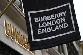 Branding for a fashion retailer Burberry is pictured outside a store in west London on May 15, 2022. (Photo by Daniel LEAL / AFP) (Photo by DANIEL LEAL/AFP via Getty Images)