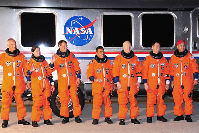 José M. Hernández (middle) on his mission to space