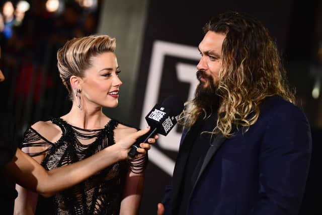 Actors Amber Heard and Jason Momoa attend the premiere of Warner Bros. Pictures' "Justice League" at Dolby Theatre on November 13, 2017 in Hollywood, California.  (Photo by Emma McIntyre/Getty Images)