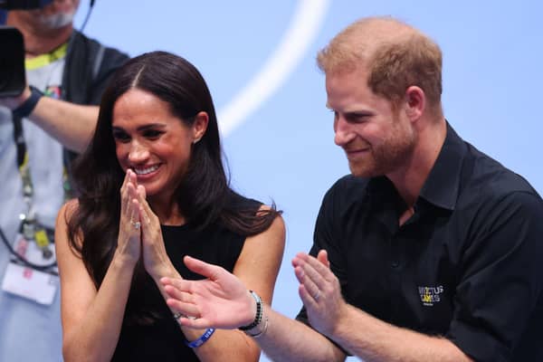 DUESSELDORF, GERMANY - SEPTEMBER 13: Prince Harry, Duke of Sussex and Meghan, Duchess of Sussex attend the Mixed Team Wheelchair Basketball Medal Ceremony during day four of the Invictus Games DÃ¼sseldorf 2023 on September 13, 2023 in Duesseldorf, Germany. (Photo by Joern Pollex/Getty Images for Invictus Games DÃ¼sseldorf 2023)