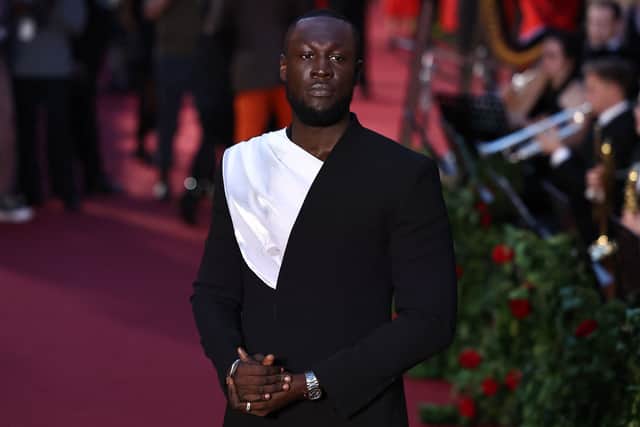 British rapper Stormzy poses upon arrival to attend the "Vogue World: London" event at the Theatre Royal Drury Lane in central London on the eve of London Fashion Week on September 14, 2023. (Photo by HENRY NICHOLLS / AFP) (Photo by HENRY NICHOLLS/AFP via Getty Images)
