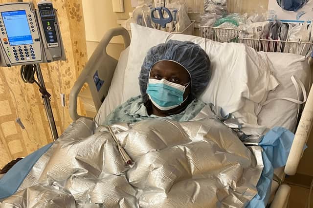 Denise Damijo in hospital following a pulmonary embolism. 