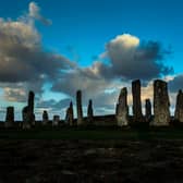 The Calanais Standing Stones are seen in the early morning light on the Isle Of Lewis, off the north-west coast of the Scottish mainland on November 24, 2021. (Photo by ANDY BUCHANAN/AFP via Getty Images)