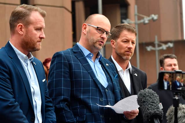 Abuse victims of former football coach Barry Bennell (L-R) Micky Fallon, Chris Unsworth and Steve Walters speak to the media outside Liverpool Crown Court.