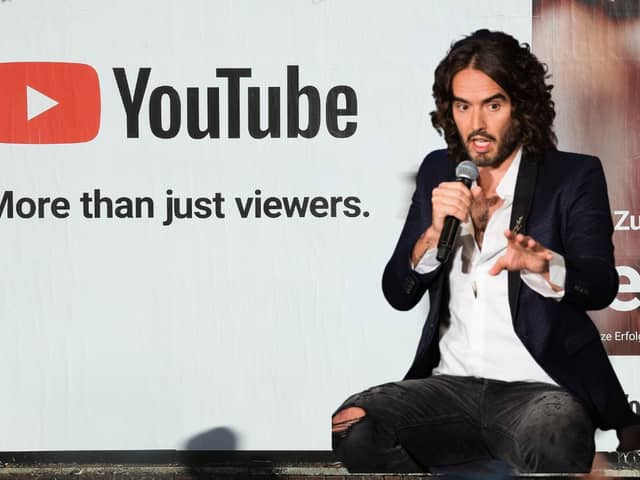 Russell Brand is just one of many who discussed conspiracy theories on YouTube (Getty)