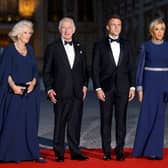 (From L) Britain's Queen Camilla, Britain's King Charles III, French President Emmanuel Macron and French president's wife Brigitte Macron arrive to attend a state banquet at the Palace of Versailles, west of Paris, on September 20, 2023, on the first day of a British royal state visit to France. Britain's King Charles III and his wife Queen Camilla are on a three-day state visit to France. (Photo by Ludovic MARIN / AFP) (Photo by LUDOVIC MARIN/AFP via Getty Images)