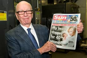 Rupert Murdoch, Chairman and CEO of News Corporation, reviews an edition of The Sun On Sunday (Picture Arthur Edwards/News International via Getty Images)