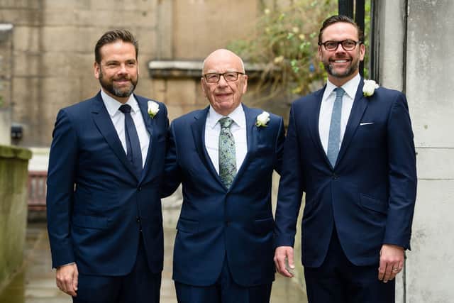 Australian born media magnate Rupert Murdoch (C) flanked by his sons Lachlan (L) and James (R) arrive at St Bride's church on Fleet Street in central London on March 5, 2016, to attend a ceremony of celebration a day after the official marriage of Rupert Murdoch and former US model Jerry Hall.Rupert Murdoch married model Jerry Hall in London on Friday March 4, 2016, less than two months after they got engaged, prompting the media mogul to describe himself as the "luckiest" man in the world. It is the fourth marriage for 84-year-old Murdoch and technically the first for Hall, 59, although she had a long-term relationship and four children with Rolling Stones frontman Mick Jagger. / AFP / Leon NEAL        (Photo credit should read LEON NEAL/AFP via Getty Images)