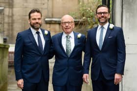 Australian born media magnate Rupert Murdoch, centre, flanked by his sons Lachlan, left, and James arrive at St Bride's church on Fleet Street in central London on March 5, 2016, to attend a ceremony of celebration a day after the official marriage of Rupert Murdoch and former US model Jerry Hall.   (Photo credit should read LEON NEAL/AFP via Getty Images)