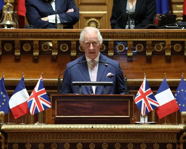Britain's King Charles addresses Senators and members of the National Assembly at the French Senate, the first time a member of the British Royal Family has spoken from the Senate Chamber, in Paris on September 21, 2023. Britain's King Charles III and his wife Queen Camilla are on a three-day state visit starting on September 20, 2023, to Paris and Bordeaux, six months after rioting and strikes forced the last-minute postponement of his first state visit as king. (Photo by Emmanuel Dunand / POOL / AFP) (Photo by EMMANUEL DUNAND/POOL/AFP via Getty Images)

