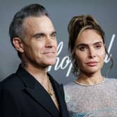 CANNES, FRANCE - MAY 23: Robbie Williams (L) and Ayda Field attend Chopard ART Evening at the Martinez on May 23, 2023 in Cannes, France. (Photo by Pascal Le Segretain/Getty Images for Chopard)