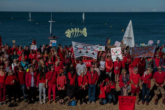 ‘We’ve had enough’: sewage campaigners descend on UK beach in protest. (Photo: Getty Images) 